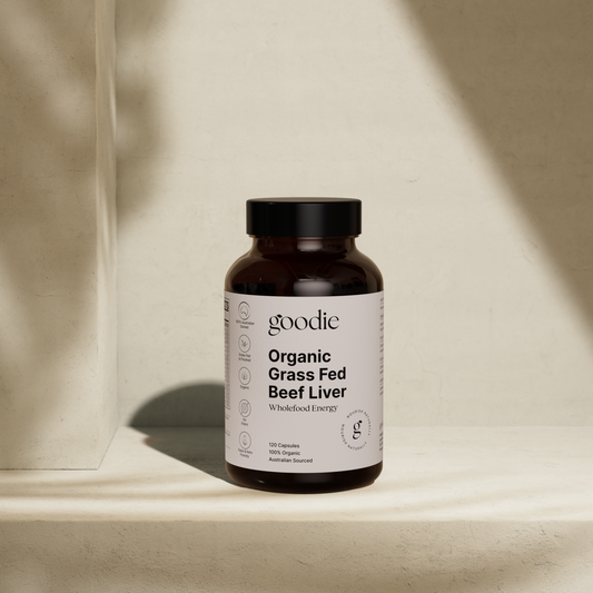 Goodie Organic Grass Fed Beef Liver supplement bottle on a beige fabric background
