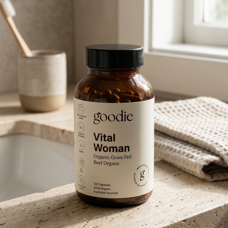 Goodie brand 'Vital Woman' supplement bottle on a bathroom counter.