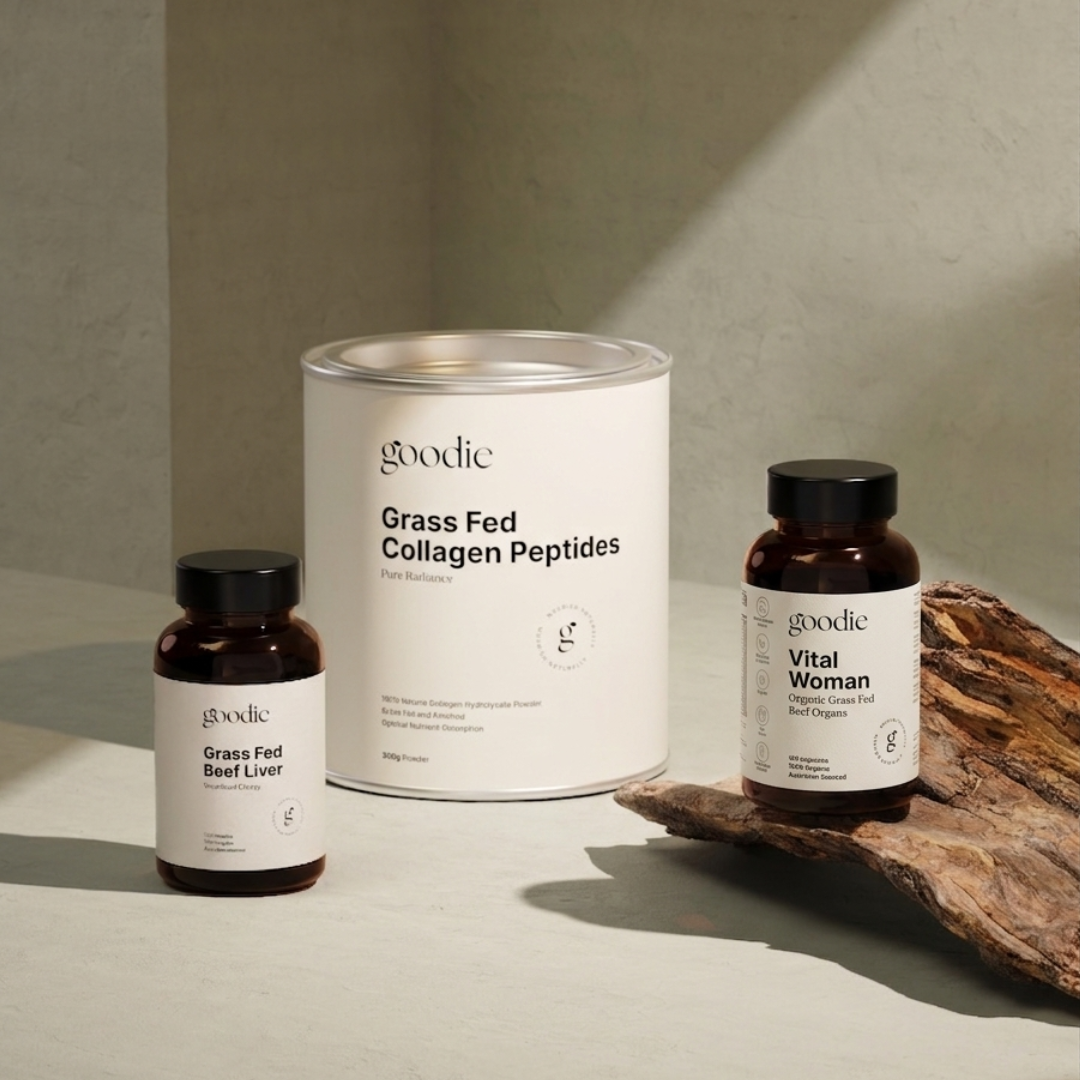 Three 'goodie' supplement bottles on a neutral background